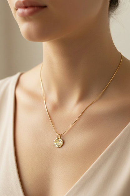 Gold fill 10mm sunburst disc pendant on 18 inch snake chain