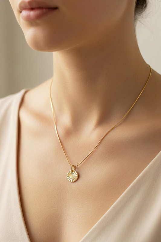 Gold fill 10mm sunburst disc pendant on 18 inch snake chain